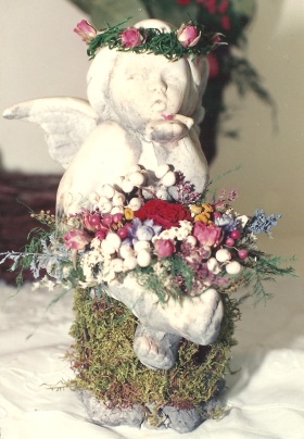 Angel decorated with dried flowers. By Keiko Nakaumura