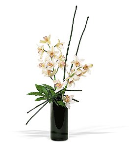 Tropical flower design featuring white cymbidium orchids and natural trellis