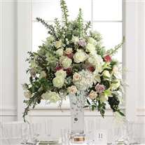 Wedding flower arrangement in glass vase